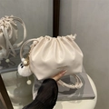 Chic cream white pleated bucket bag with plush charm and drawstring closure for women - White With Pendant
