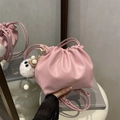 Pink pleated drawstring bucket bag with plush charm and fashion leather text - Pink With Pendant