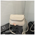 Chic beige crossbody flap bag with silver brand logo and adjustable shoulder strap - Khaki