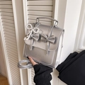 Silver metallic collegiate backpack with bow accents and pearl pendant for women - Silver (With Pearl Bow Pendant)