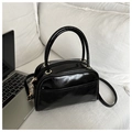 Fashionable black glossy patent leather pillow bag with top handles and shoulder strap - Black