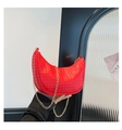 Vibrant red woven crescent bag with a gold chain strap for stylish women - Red