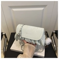 Detail of light green pleated crossbody bag with silver chain and plush charm - With Pendant / Green