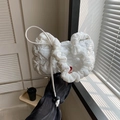 White quilted cloud bag with drawstring straps and embroidery for casual summer style - White