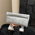 Borsa a mano grigio argento con trama a serpente e design pieghevole elegante - Argento