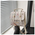 Cream-white backpack with floral bear prints and golden metal buckle detail - Off White