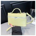 Minimalist light green box bag in litchi textured leather with silver double zippers - Green