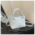 Borsa a secchiello azzurra con trama litchi, manico superiore e tracolla in stile fashion - Blu