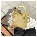Mini yellow bucket bag with lychee texture featuring pearl lace bow and shoulder strap - Yellow With Pendant