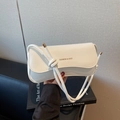 Minimalist white flap crossbody bag with decorative knot strap and gold lettering - Off White