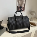 Large travel duffel bag in black honeycomb pattern with leather handles and strap - Black (Monogram Print)