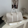 Large cream travel bag with brown monogram pattern, top handles, and shoulder strap - White (Monogram Print)