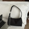 Black nylon shoulder bag with silver chain strap and pleated texture for casual commute - Black