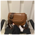 Detail of suede caramel crossbody bag with U-shaped stitching and wide nylon strap - Brown