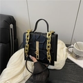 Minimalist black pleated handbag with thick gold chain strap and square metal lock - Black