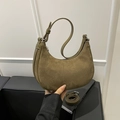 Olive green faux suede crescent shoulder bag with adjustable strap and silver hardware - Green