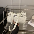 White PU leather shoulder bag with silver rivet details and retro buckle straps - White
