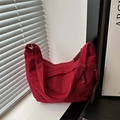 Minimalist red corduroy crossbody crescent bag with adjustable strap and large capacity - Red