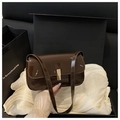 Deep brown patent leather shoulder bag with a gold rectangular metal buckle clasp - Coffee