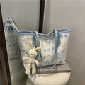 White printed tote bag with blue graffiti patterns and a cute rabbit plush pendant - Blue with Pendant