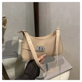 Minimalist beige shoulder bag in matte faux leather with wide strap and silver buckle detail - Khaki