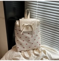 Mochila blanco crema con estampado de lazos rojos y colgante de perla en variante - Blanco