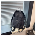Black nylon sling bag with pleated texture and round metallic M logo detail - Black