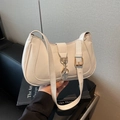 Elegant white minimalist PU leather hobo shoulder bag with a metallic buckle detail - Off White