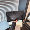 Classic black envelope clutch bag with premium crocodile embossed texture and V-flap - Black