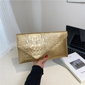 Chic gold crocodile embossed envelope clutch bag in faux leather for autumn fashion - Gold