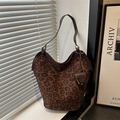 Large leopard print tote bag with brown leather trim and a heart-shaped charm accessory - With Heart Charm Style / Leopard Coffee