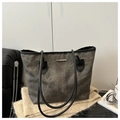 Close-up of vintage grey tote bag with washed texture and gold metal accents - Black (Without Charm)