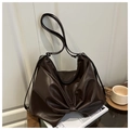 Deep brown tote bag with decorative bow design and adjustable strap in chic faux leather - Coffee