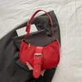 Minimalist red matte leather dumpling bag with decorative large silver buckle detail - Red