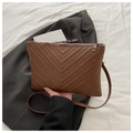 Brown quilted envelope crossbody bag with silver studs and adjustable strap - Brown
