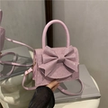Elegant purple rhinestone mini evening bag with a large sparkling bow and shoulder strap - Pink