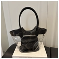 Detail of transparent PVC tote bag with black leather inner pouch and cylindrical handles - Transparent Black