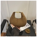 Detail of coffee suede crescent bag showing gold zipper and adjustable shoulder strap - Khaki