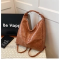 Braune Leder Hobo-Tasche mit vielseitigen Schulter- und Rucksackgurten für Damen - Braun