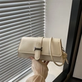 Minimalist cream white rectangular PU leather handbag with silver clasp and slim shoulder strap - White