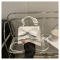 Bolso de mano blanco minimalista con lazo grande y asa de cuerda retorcida en acabado suave - Blanco