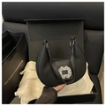 Elegant black leather hobo bag with crystal buckle in a luxury gift box packaging - Black