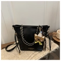 Minimalist black faux suede chain tote bag with a brown bear pendant and gold lettering - With Pendant / Black / Small
