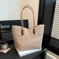 Bolso tote minimalista de piel beige con asas marrones para el transporte diario - Caqui