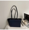 Spacious black leather tote bag shown with a tablet to highlight its large capacity - Black