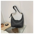 Detail of black lychee grain leather hobo bag with gold zipper and adjustable strap - Black