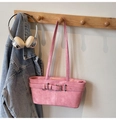 Detail of pink vintage leather shoulder bag with decorative belt and silver buckles - Pink