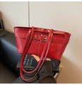 Red retro textured leather tote bag featuring elegant metal buckle and long handles - Red