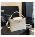 Elegant white PU leather handbag with gold V-decoration and adjustable strap for women - White