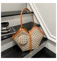 Detail of vintage geometric plaid bucket bag with V-shaped opening and matching coin purse - Khaki